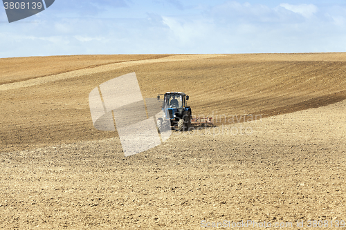 Image of tractor in the field  