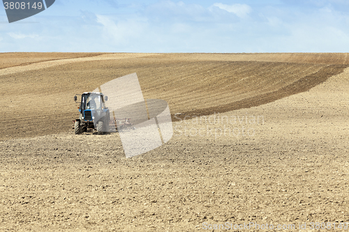 Image of tractor in the field  