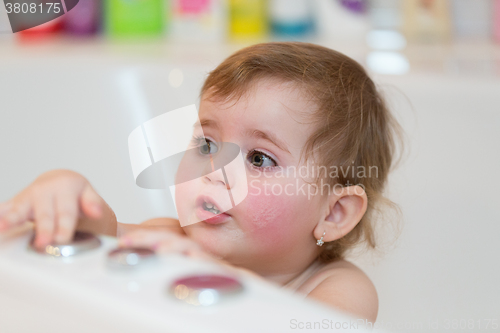 Image of little girl taking spa bath