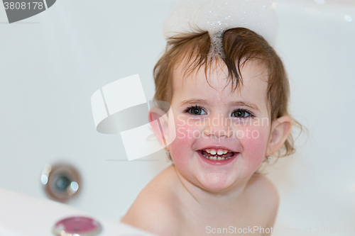 Image of little girl taking spa bath