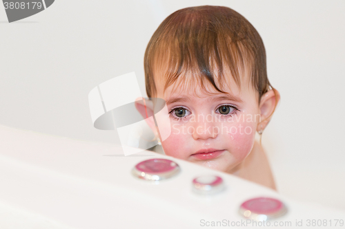 Image of little girl taking spa bath