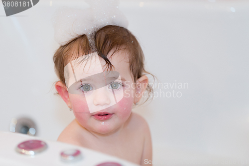 Image of little girl taking spa bath