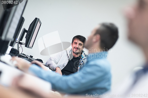 Image of photo editors on work