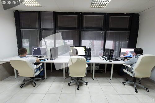 Image of photo editor at his desk