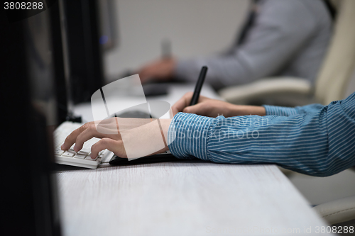 Image of photo editor at his desk