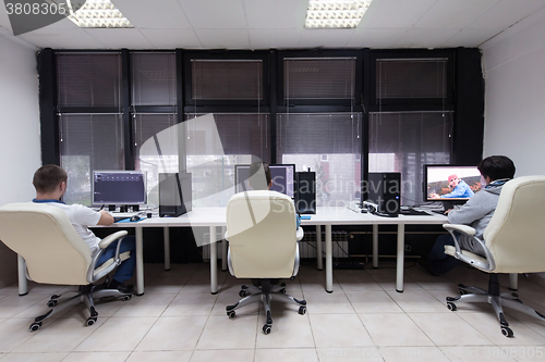 Image of photo editor at his desk