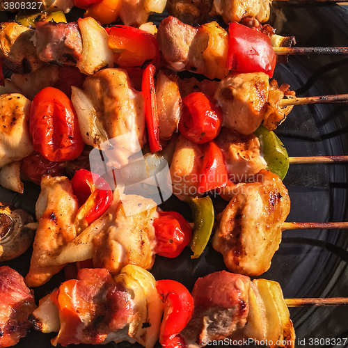 Image of Grilled meat and vegetable skewers