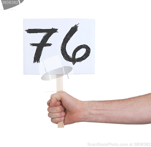 Image of Sign with a number, 76