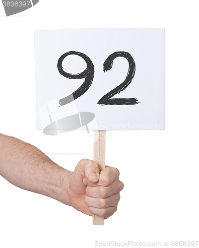 Image of Sign with a number, 92