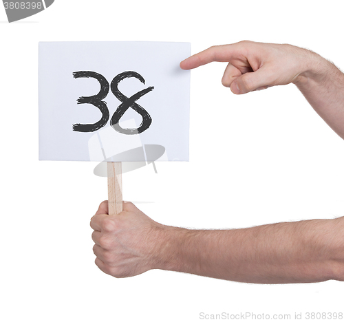 Image of Sign with a number, 38