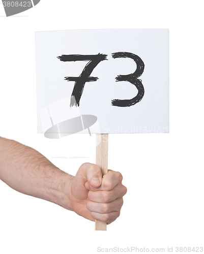 Image of Sign with a number, 73