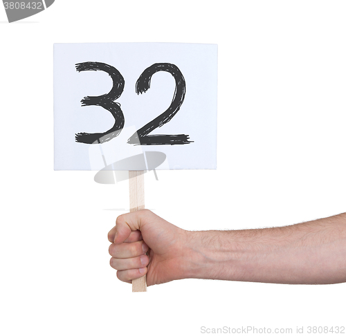 Image of Sign with a number, 32