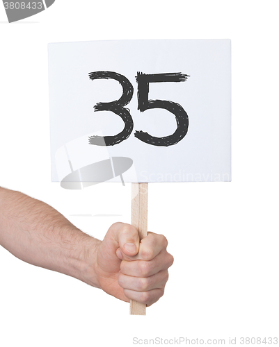 Image of Sign with a number, 35