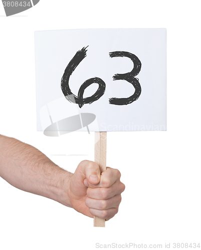 Image of Sign with a number, 63