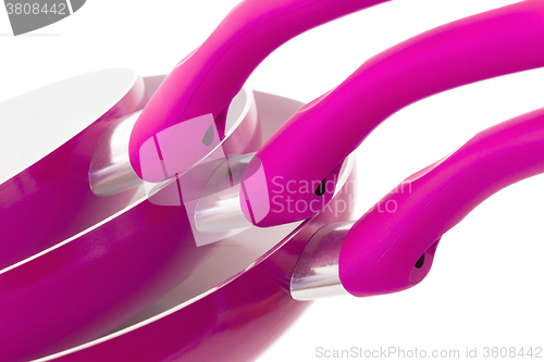 Image of Set of three frying pans, pink