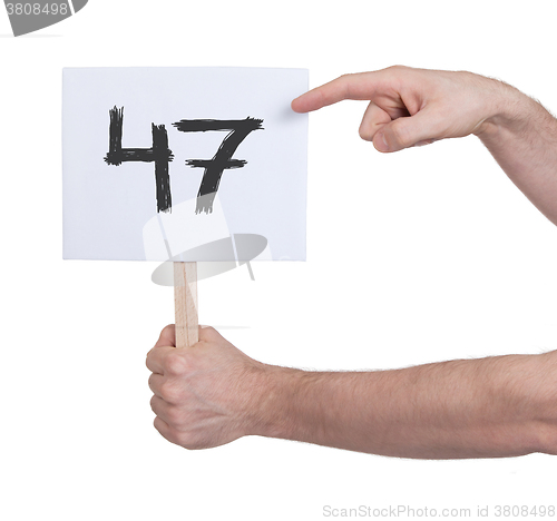 Image of Sign with a number, 47