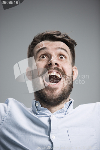 Image of The  young man looking at camera 