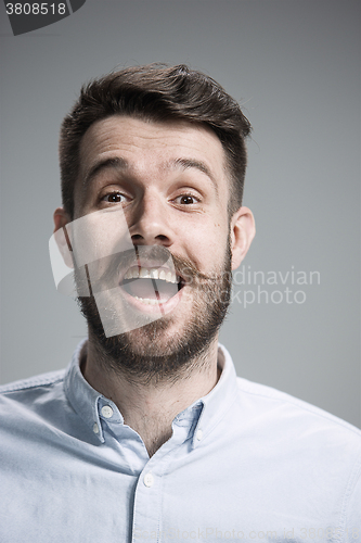 Image of The  young man looking at camera 