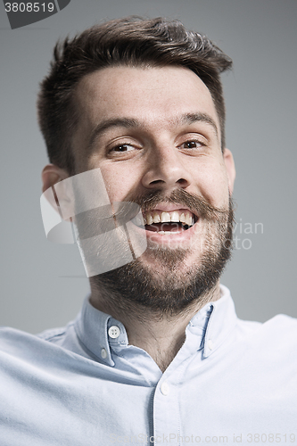 Image of The  young man looking at camera 