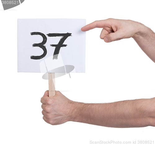 Image of Sign with a number, 37