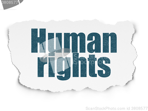 Image of Political concept: Human Rights on Torn Paper background