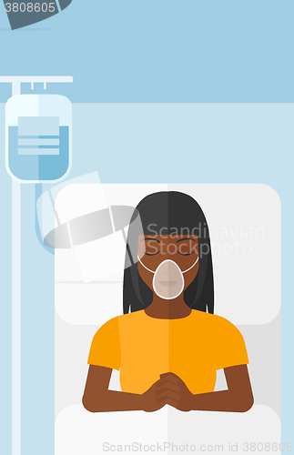 Image of Patient lying in hospital bed.