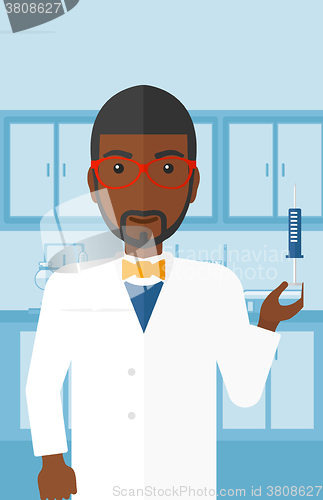 Image of Doctor with syringe in laboratory.