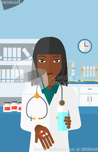 Image of Pharmacist giving pills.