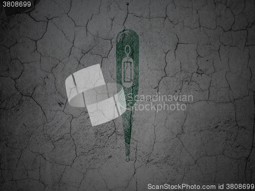 Image of Medicine concept: Thermometer on grunge wall background