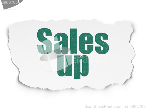 Image of Advertising concept: Sales Up on Torn Paper background