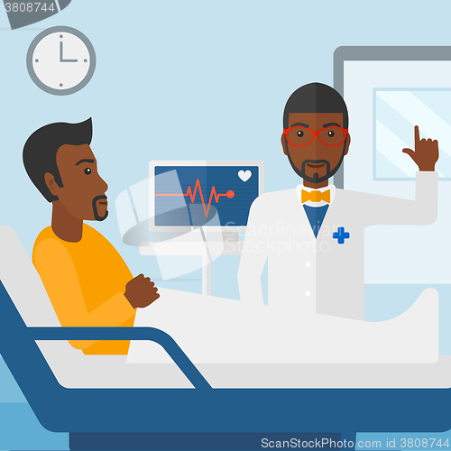 Image of Doctor visiting patient.