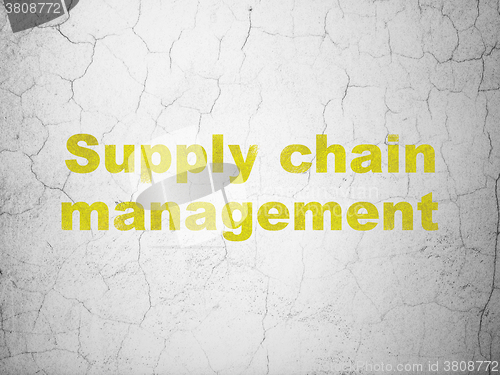 Image of Advertising concept: Supply Chain Management on wall background