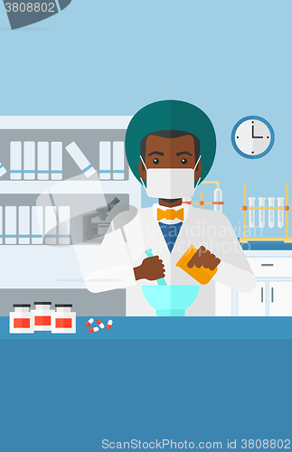 Image of Pharmacist preparing medicine.