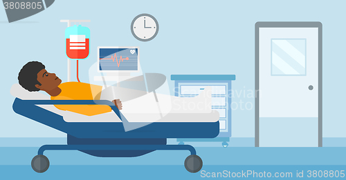 Image of Patient lying in hospital bed.