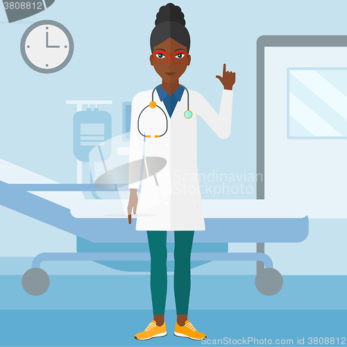 Image of Doctor showing finger up.