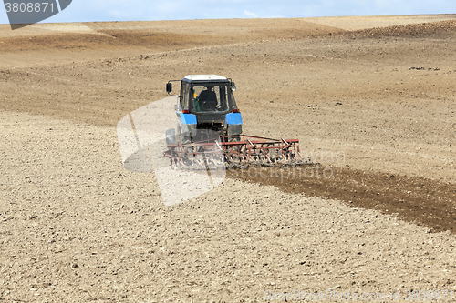 Image of tractor in the field  