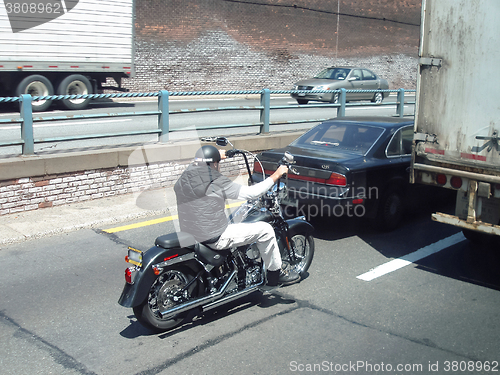 Image of Man on motorcycle