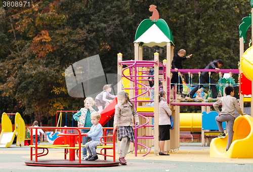 Image of Children playing in an outdoor playground