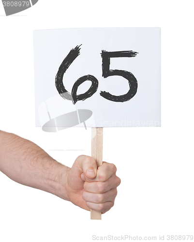 Image of Sign with a number, 65