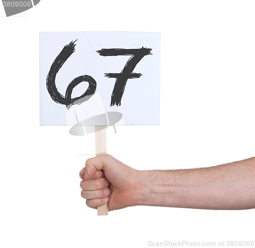 Image of Sign with a number, 67