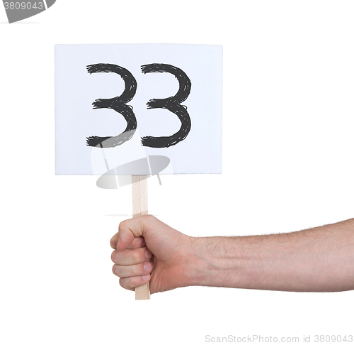 Image of Sign with a number, 33