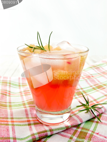 Image of Lemonade with rhubarb and rosemary on checkered napkin