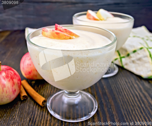 Image of Jelly airy apple in glass bowl with cinnamon on board