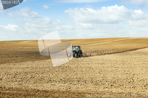 Image of tractor in the field  