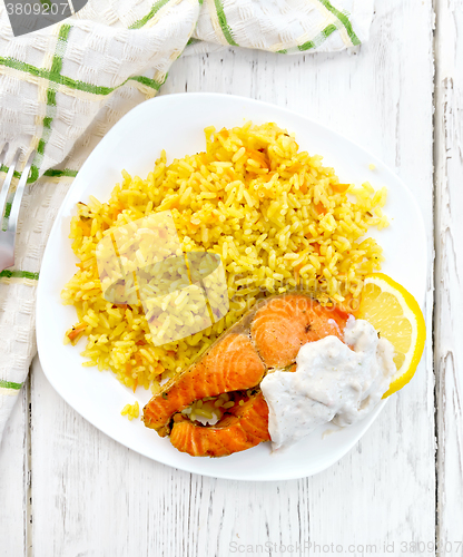 Image of Salmon with rice on board top