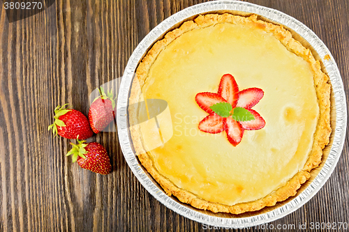 Image of Pie strawberry with sour cream and berries on board top