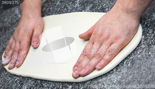 Image of Making the Pizza - Hands Detail 