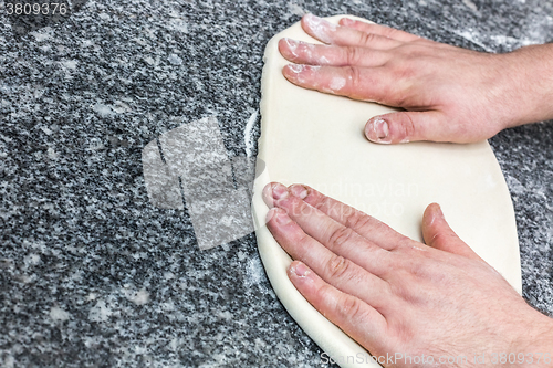 Image of Making the Pizza - Hands Detail 