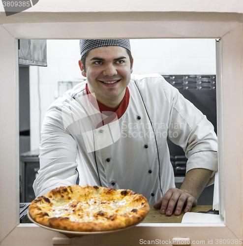 Image of Happy Chef with Fresh Pizza