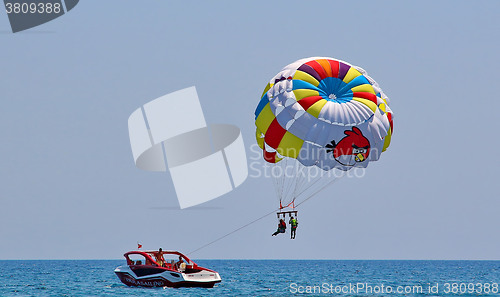 Image of Parasailing in a blue sky 